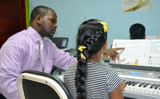 Image of Teacher and Student at DianJen